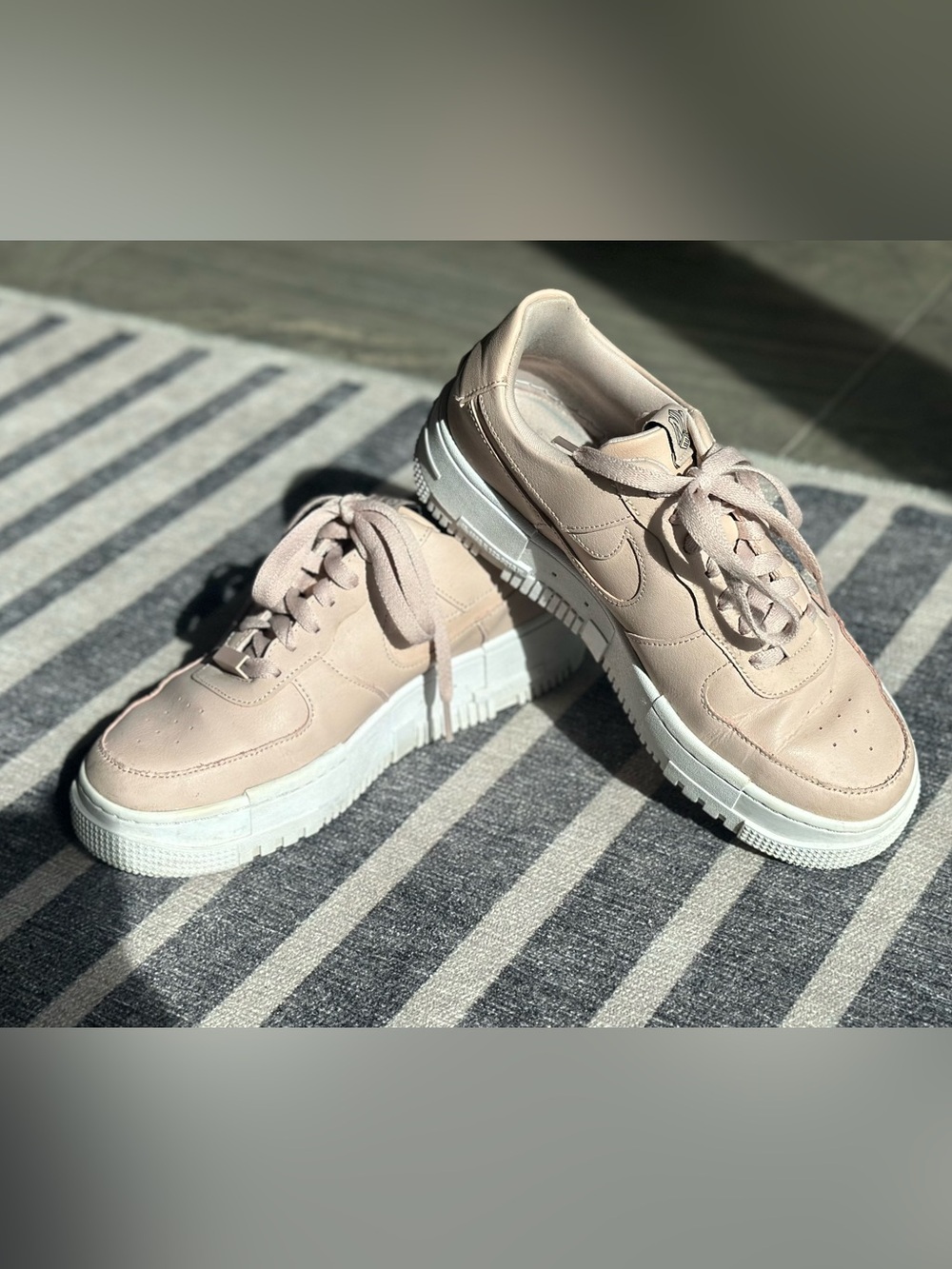 Nike women’s platform Air Force 1 Low-Top Lace-Up Sneakers in Blush Pink